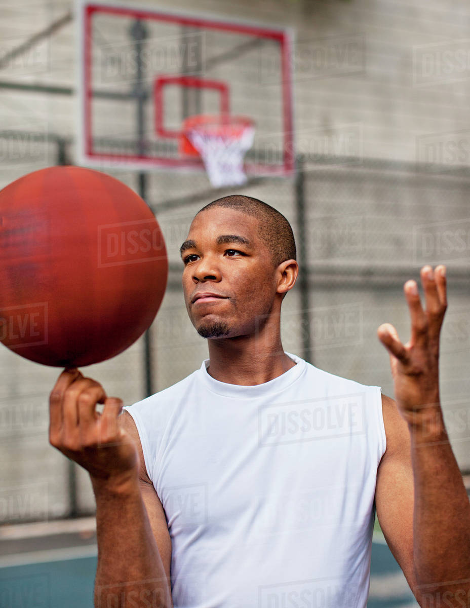 pix Spinning Basketball On Finger Pose